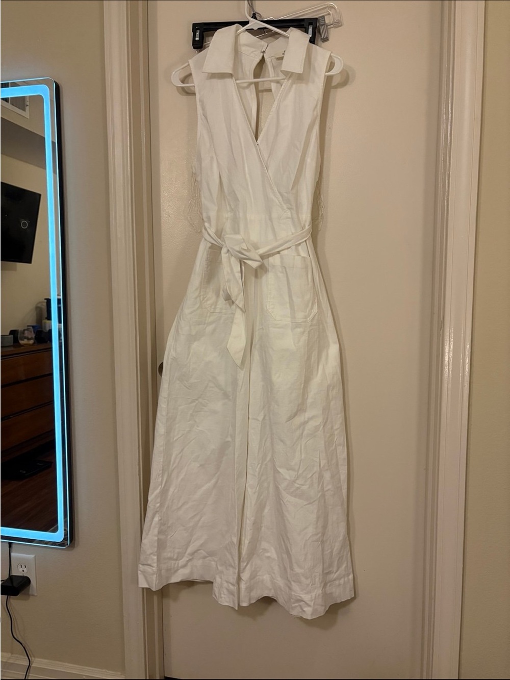 Sleeveless White Wrap jumpsuit size large with Tie Waist